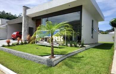 Imagem: A casa possui 3 Dormitórios, 4 Banheiros, 4 Vagas na garagem