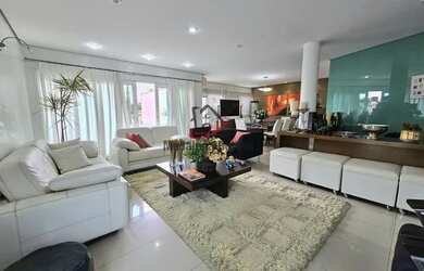 Imagem: A casa possui 4 Dormitórios, 5 Banheiros, 5 Vagas na garagem