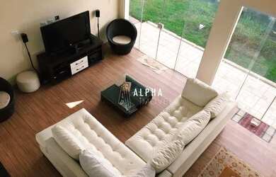 Imagem: A casa em condomínio possui 4 Dormitórios, 5 Banheiros, 1