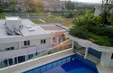 Imagem: A casa em condomínio possui 5 Dormitórios, 5 Banheiros, 5