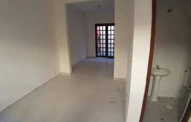 Imagem: A casa possui 2 Dormitórios, 1 Banheiro, 1 Vaga na garagem