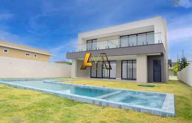 Imagem: A casa em condomínio possui 5 Dormitórios, 5 Banheiros, 4