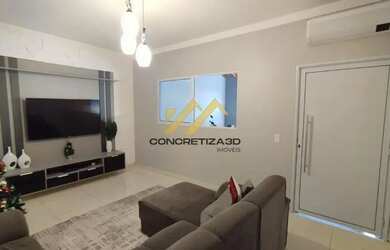 Imagem: A casa possui 3 Dormitórios, 2 Banheiros, 2 Vagas na garagem