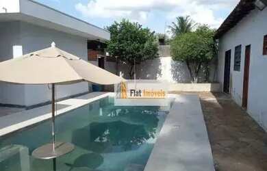 Imagem: A casa possui 3 Dormitórios, 3 Banheiros, 5 Vagas na garagem