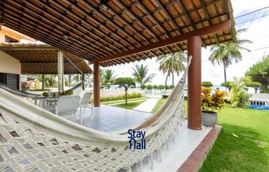 Imagem: A casa possui 4 Dormitórios, 3 Vagas na garagem e está localizado