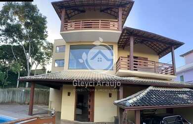 Imagem: A casa possui 3 Dormitórios, 5 Banheiros, 3 Vagas na garagem