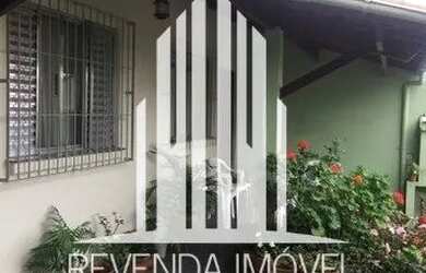 Imagem: A casa possui 4 Dormitórios, 4 Banheiros, 4 Vagas na garagem