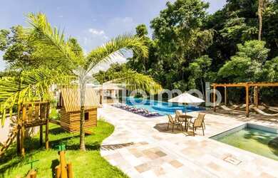 Imagem: A casa em condomínio possui 4 Dormitórios, 5 Banheiros, 2