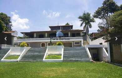 Imagem: A casa em condomínio possui 5 Dormitórios, 5 Banheiros, 5