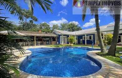 Imagem: A casa em condomínio possui 4 Dormitórios, 5 Banheiros, 5