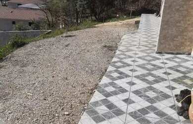 Imagem: A casa possui 3 Dormitórios, 1 Banheiro, 1 Vaga na garagem