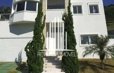 Imagem: A casa em condomínio possui 5 Dormitórios, 5 Banheiros, 5