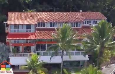 Imagem: A casa em condomínio possui 4 Dormitórios, 3 Vagas na garagem