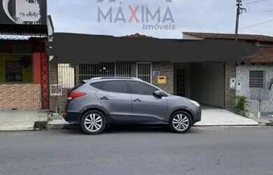 Imagem: A casa possui 1 Dormitório, 2 Banheiros, 2 Vagas na garagem