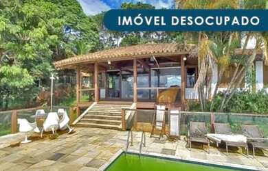 Imagem: A casa possui 2 Dormitórios, 2 Banheiros, 1 Vaga na garagem