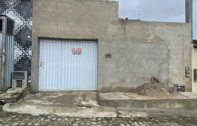 Imagem: A casa à venda possui 2 Dormitórios, 1 Banheiro e 2 Vagas