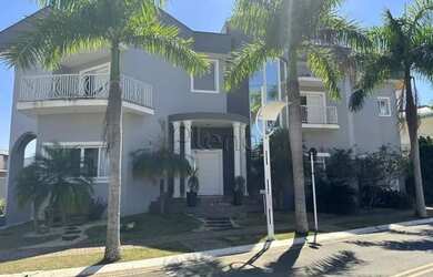 Imagem: A casa em condomínio possui 4 Dormitórios, 5 Banheiros, 4