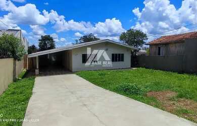 Imagem: A casa possui 3 Dormitórios, 2 Banheiros, 2 Vagas na garagem