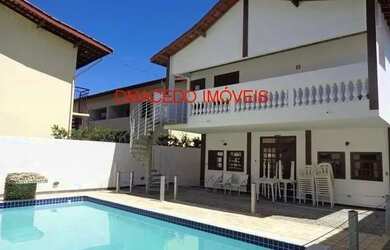 Imagem: A casa possui 5 Dormitórios, 5 Banheiros, 5 Vagas na garagem