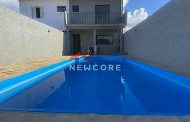 Imagem: A casa possui 2 Dormitórios, 3 Banheiros, 2 Vagas na garagem