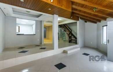 Imagem: A casa possui 5 Dormitórios, 5 Banheiros, 5 Vagas na garagem