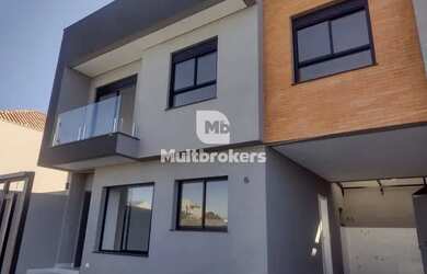 Imagem: A casa possui 3 Dormitórios, 3 Banheiros, 2 Vagas na garagem