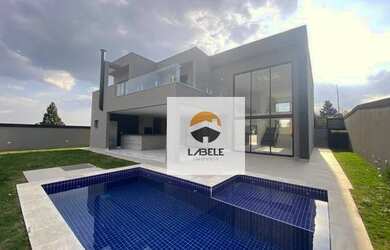 Imagem: A casa em condomínio possui 4 Dormitórios, 5 Banheiros, 5