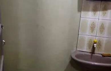 Imagem: A casa possui 2 Dormitórios, 2 Banheiros e está localizado