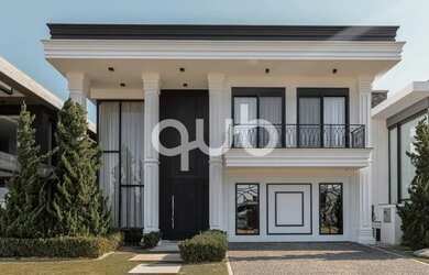 Imagem: A casa possui 5 Dormitórios, 5 Banheiros, 2 Vagas na garagem