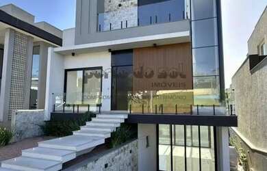 Imagem: A casa em condomínio possui 3 Dormitórios, 4 Banheiros, 2