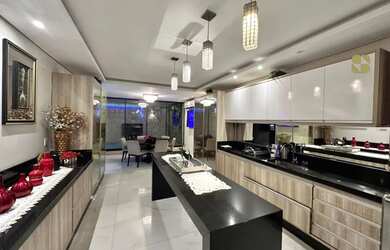 Imagem: A casa em condomínio possui 4 Dormitórios, 4 Banheiros, 2