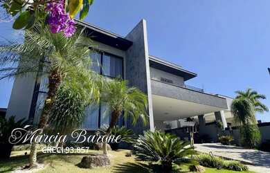 Imagem: A casa em condomínio possui 4 Dormitórios, 5 Banheiros, 4