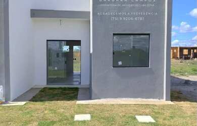 Imagem: A casa possui 2 Dormitórios, 1 Banheiro, 2 Vagas na garagem