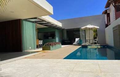 Imagem: A casa possui 3 Dormitórios, 4 Banheiros, 2 Vagas na garagem