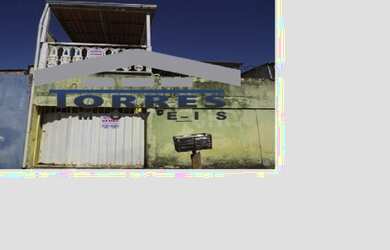 Imagem: A casa possui 3 Dormitórios, 1 Banheiro, 2 Vagas na garagem