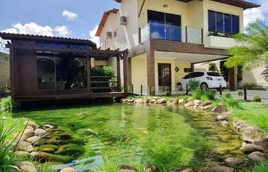 Imagem: A casa em condomínio possui 4 Dormitórios, 5 Banheiros, 300m²