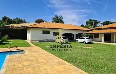 Imagem: A casa em condomínio possui 5 Dormitórios, 5 Banheiros, 5