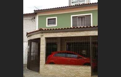 Imagem: A casa possui 3 Dormitórios, 1 Banheiro, 2 Vagas na garagem