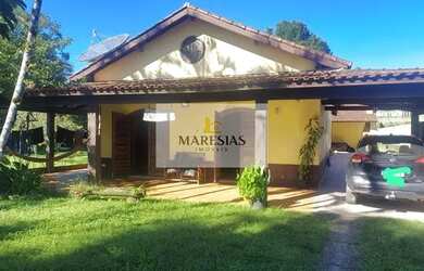 Imagem: A casa possui 3 Dormitórios, 4 Banheiros, 2 Vagas na garagem