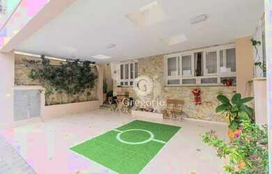 Imagem: A casa possui 3 Dormitórios, 4 Banheiros, 3 Vagas na garagem