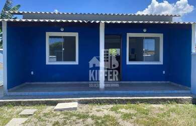 Imagem: A casa possui 2 Dormitórios, 3 Banheiros, 4 Vagas na garagem