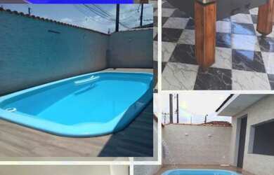 Imagem: A casa possui 2 Dormitórios, Acomodam 15 pessoas, 4 Vagas na