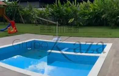 Imagem: A casa em condomínio possui 4 Dormitórios, 5 Banheiros, 4