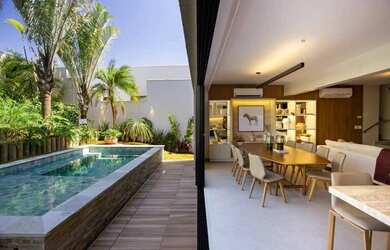 Imagem: A casa possui 4 Dormitórios, 4 Banheiros, 2 Vagas na garagem