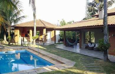 Imagem: A casa em condomínio possui 5 Dormitórios, 5 Banheiros, 4