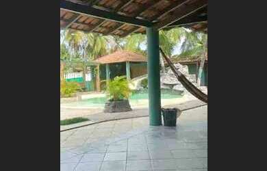 Imagem: A casa possui 5 Dormitórios, 5 Banheiros, 5 Vagas na garagem