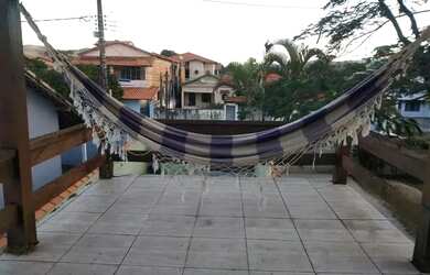 Imagem: A casa possui 2 Dormitórios, 2 Banheiros, 4 Vagas na garagem