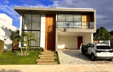 Imagem: A casa possui 4 Dormitórios, 5 Banheiros, 3 Vagas na garagem