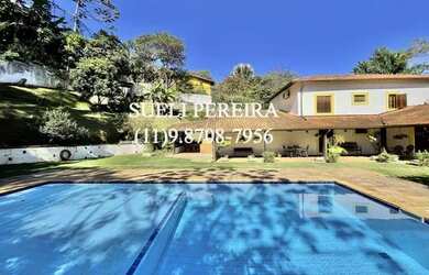 Imagem: A casa em condomínio possui 4 Dormitórios, 4 Banheiros, 5