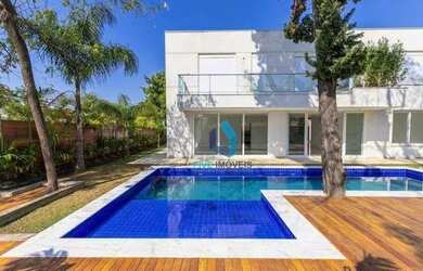 Imagem: A casa em condomínio possui 4 Dormitórios, 5 Banheiros, 5